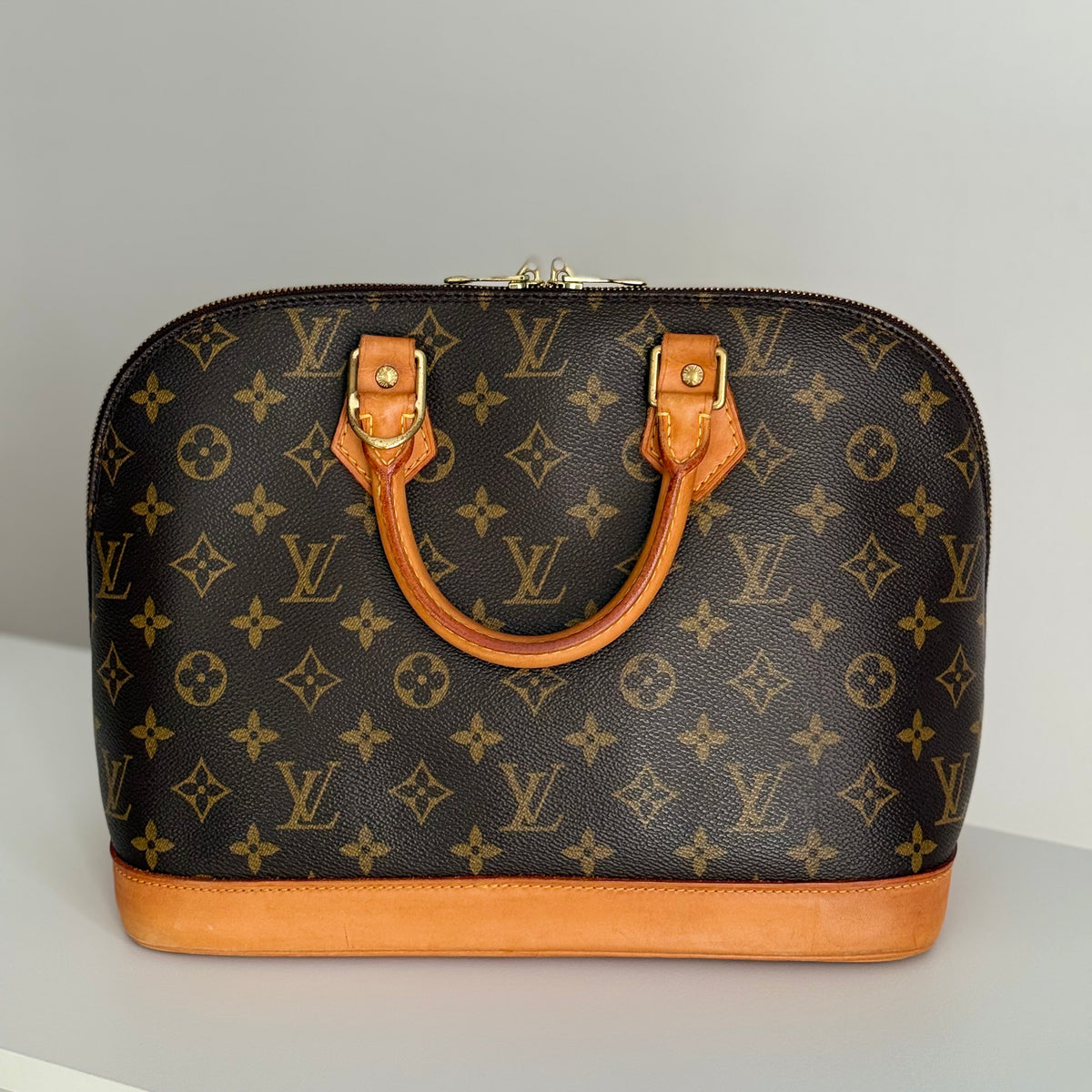 Louis Vuitton Alma PM Monogram Canvas Leather Handbag