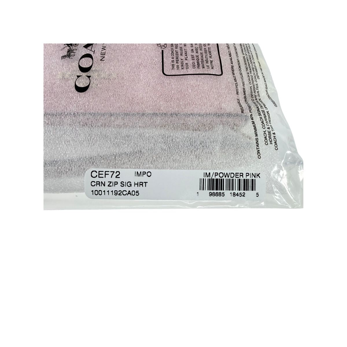 COACH Powder Pink Corner Zip Wristlet In Signature Canvas With Charms BNIB