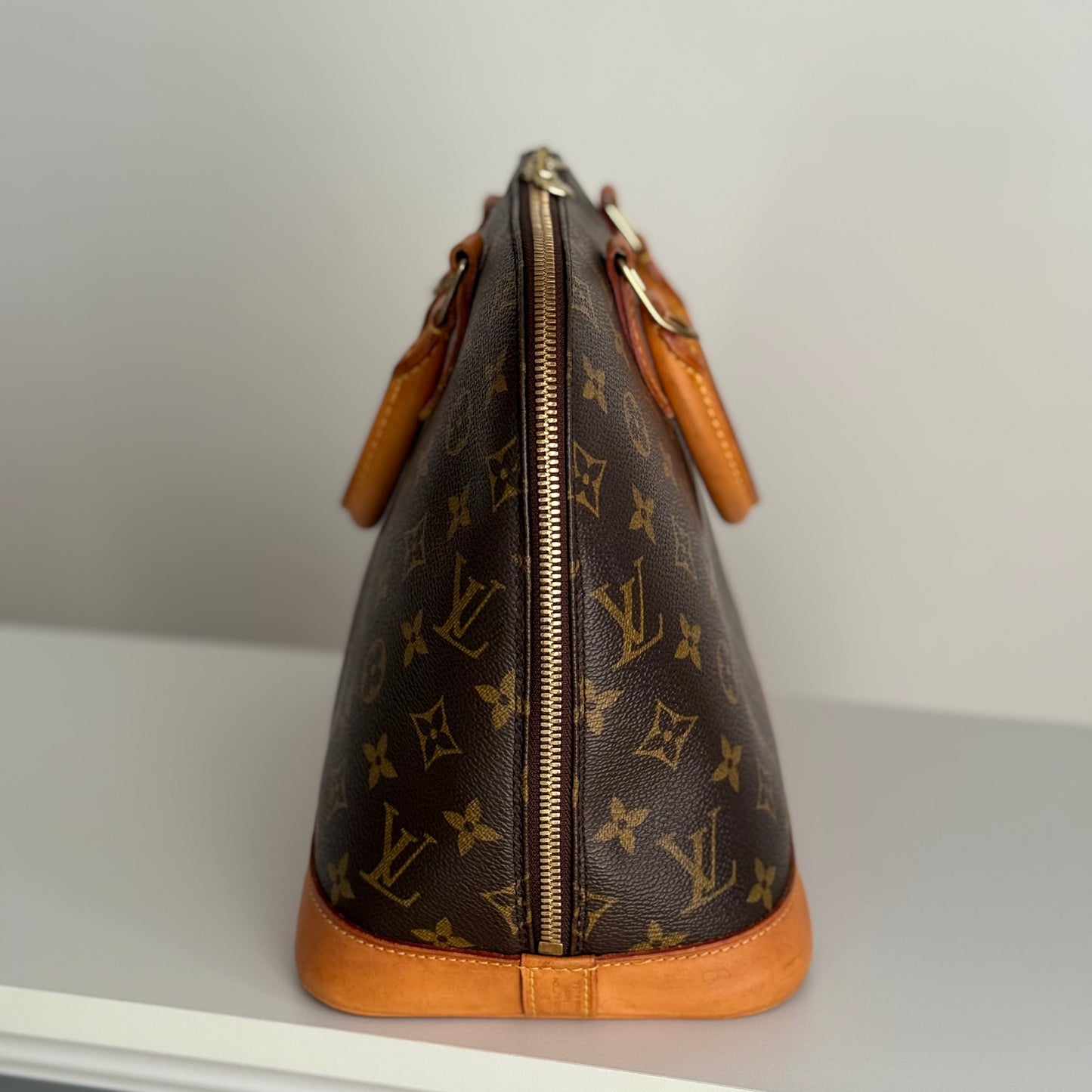 Louis Vuitton Alma PM Monogram Canvas Leather Handbag