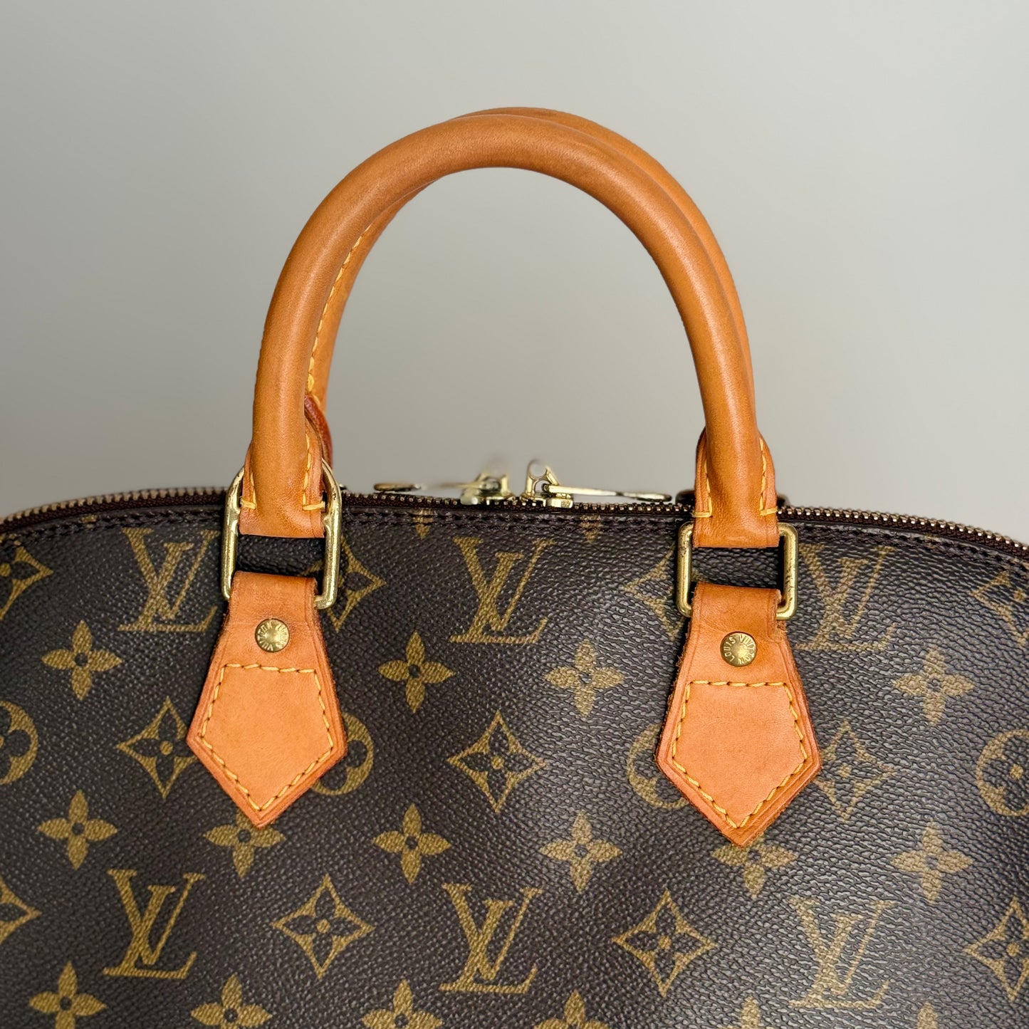 Louis Vuitton Alma PM Monogram Canvas Leather Handbag