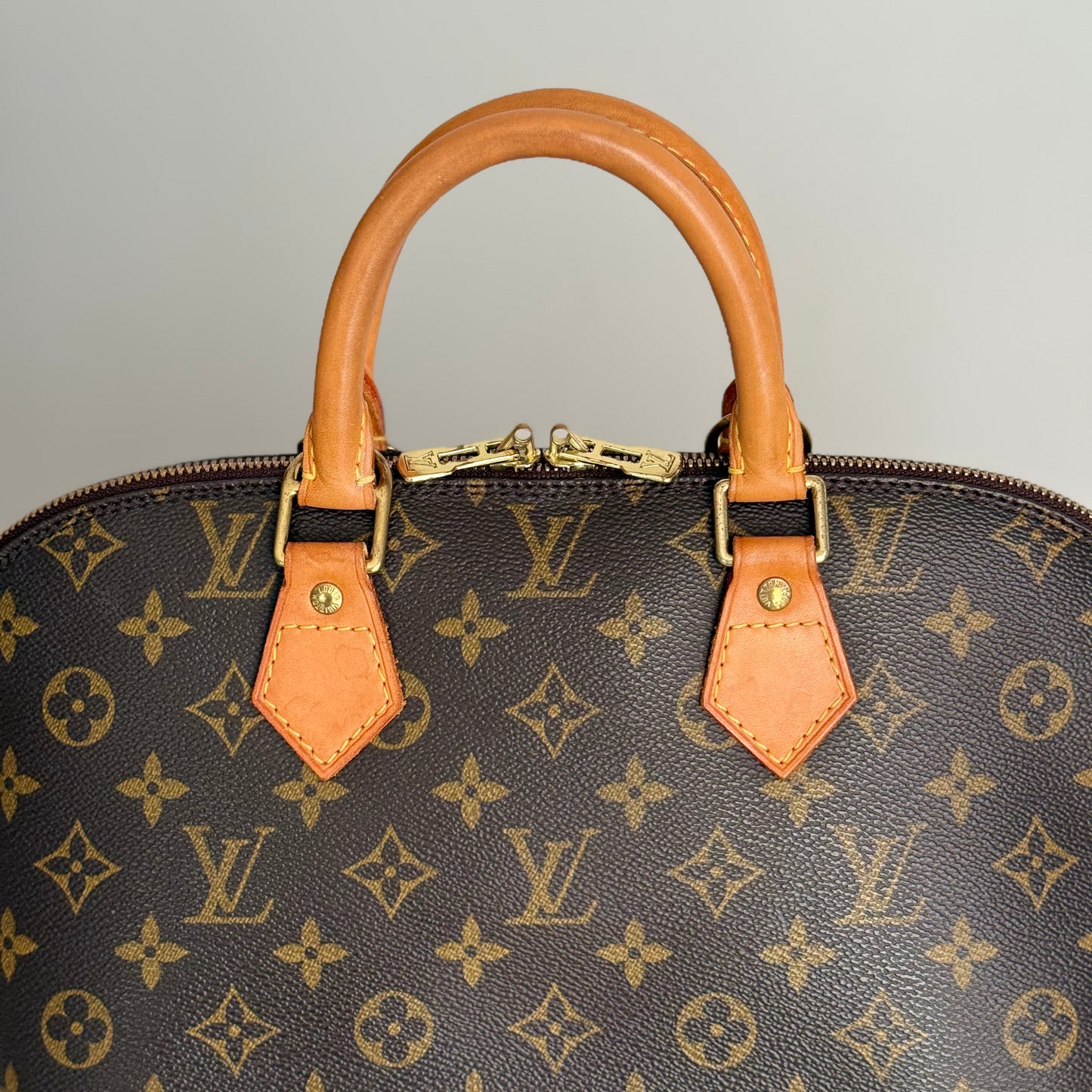 Louis Vuitton Alma PM Monogram Canvas Leather Handbag